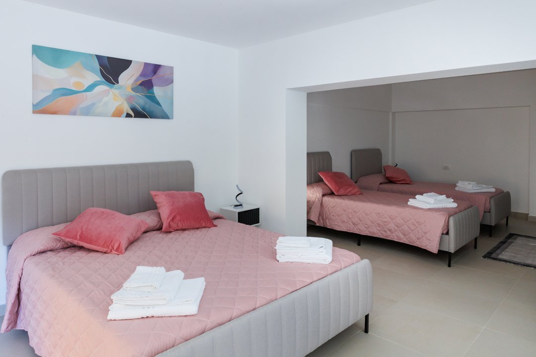 Apartamento con habitación cuádruple